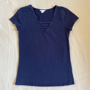 Tight fitted, dark blue top